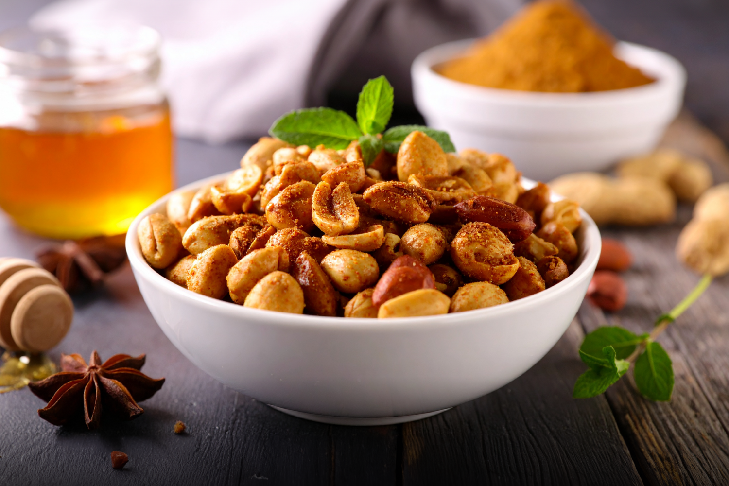 Bowl of festive roasted nuts seasoned with Paprika Lemon & Lime for a holiday appetizer